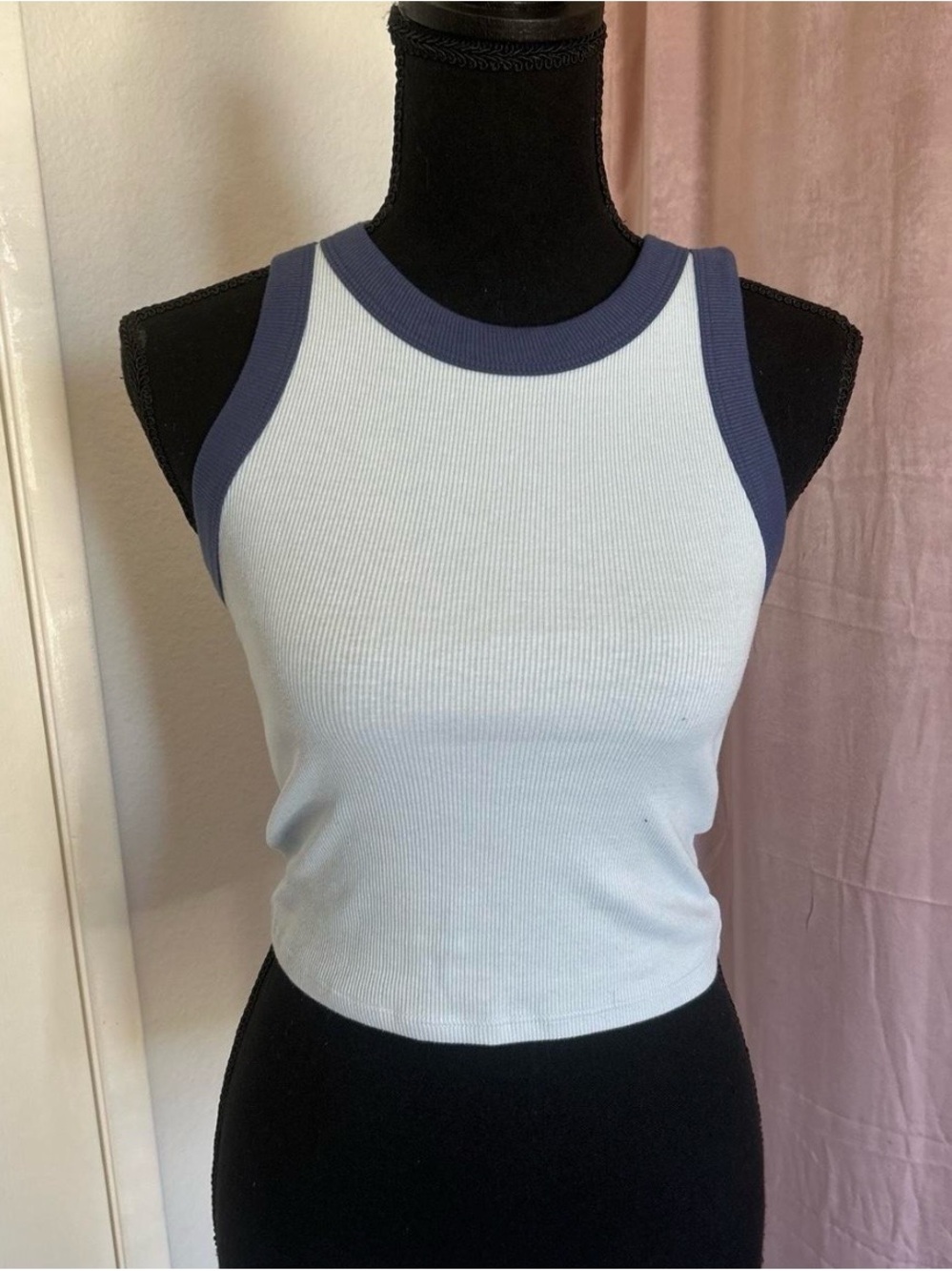 Blue tank top with a sporty vibe